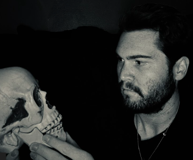 Justin holding a skull